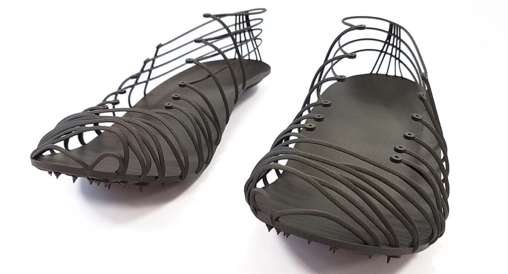 Pleko track spikes with structural part 3D printed as single unit using Carbon fiber filled composite material Windform® SP. Courtesy CRP Technology/Miro Buroni
