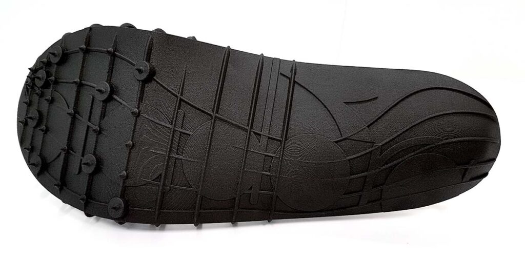 Pleko track spikes with structural part 3D printed as single unit using Windform® SP. Outsole with pins and grip optimizing parts. Courtesy CRP Technology/Miro Buroni