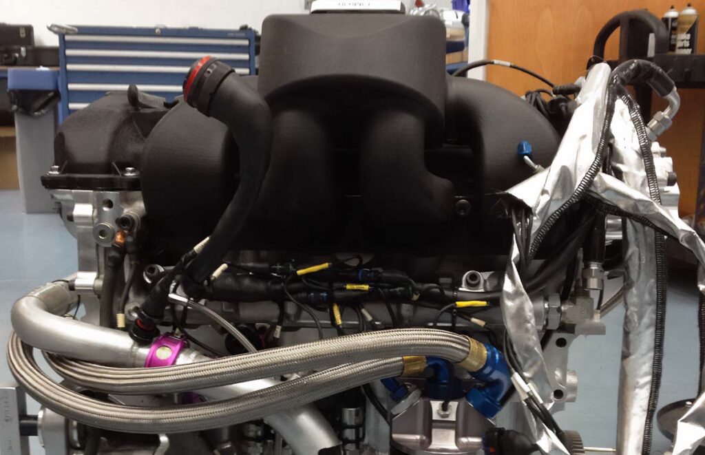 The 3D printed intake manifold in Windform SP mounted on engine