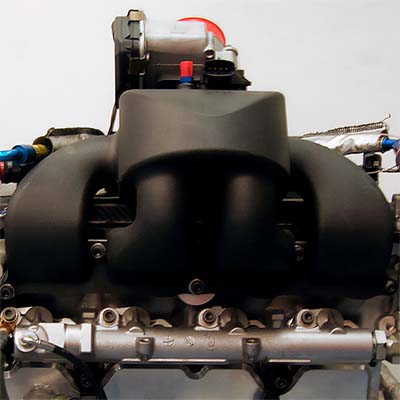 The 3D printed intake manifold in Windform SP mounted on engine