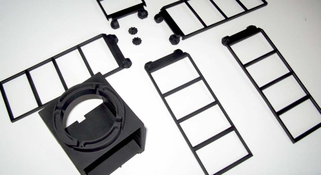 Construction of the entire structure of a functional 2U CubeSat with propulsion subsystem using PBF 3D printing process and carbon fiber reinforced composite
