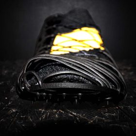 Pleko track spikes with outsole, midsole, pins and ribbing 3D printed as single unit in Carbon fiber filled composite material Windform® SP. Courtesy CRP Technology/Miro Buroni