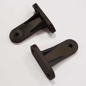 T-shaped attachment brackets. Above, the original one, bonded. Below, the new 3d printed one